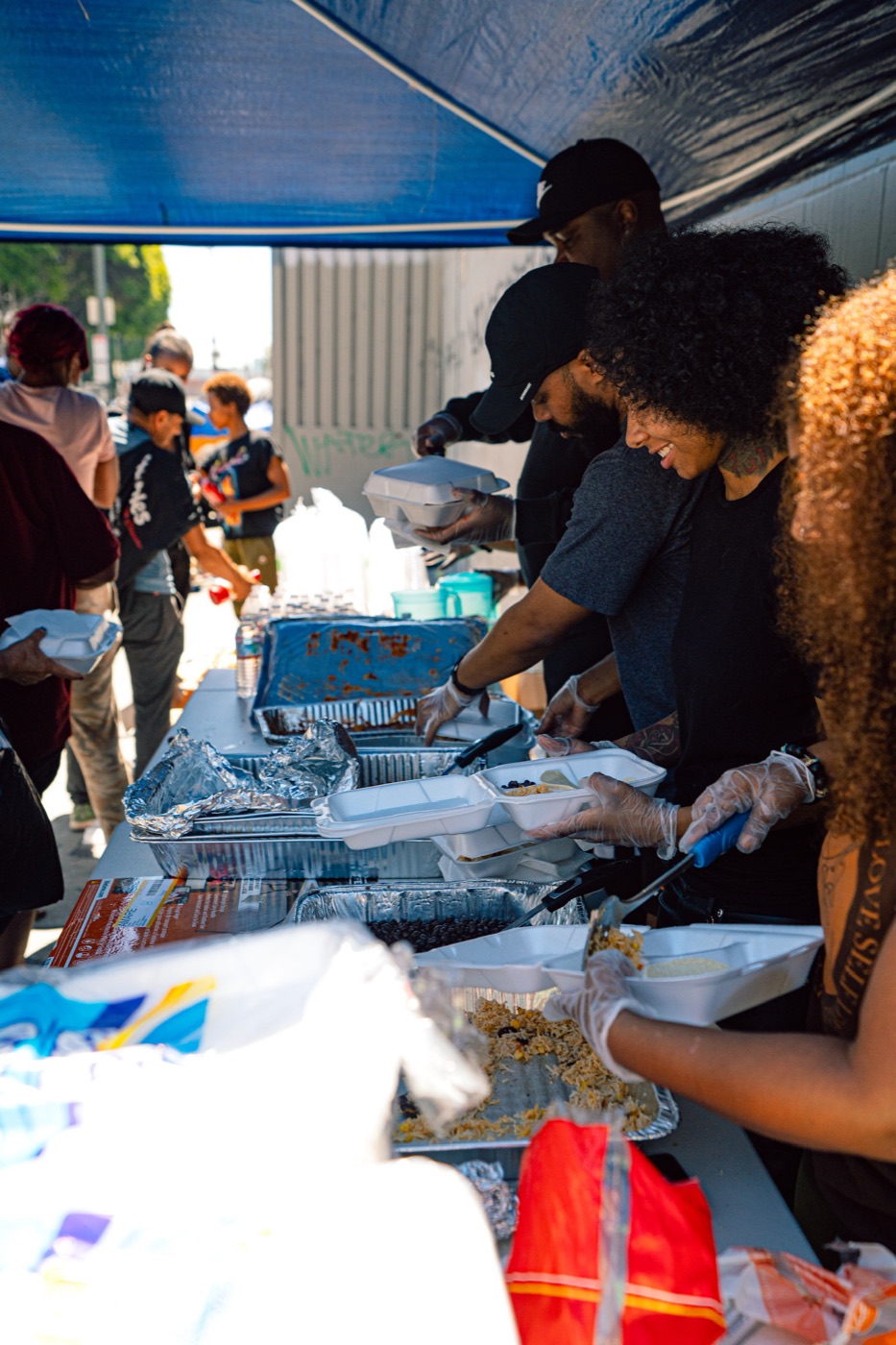 PACK Project volunteers packing meals