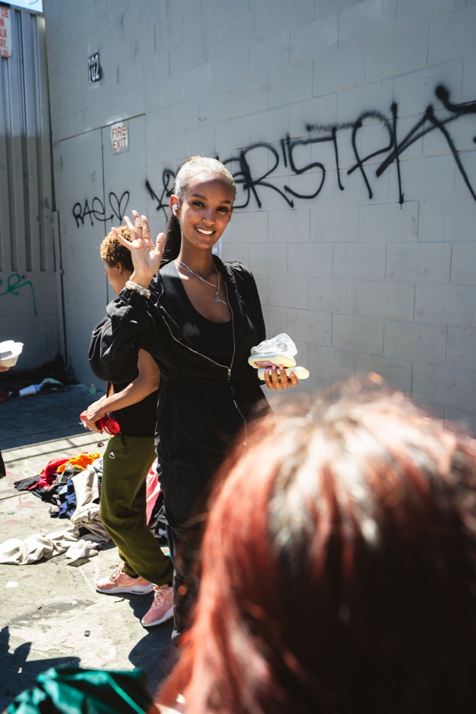 Community member smiling at a PACK Project event
